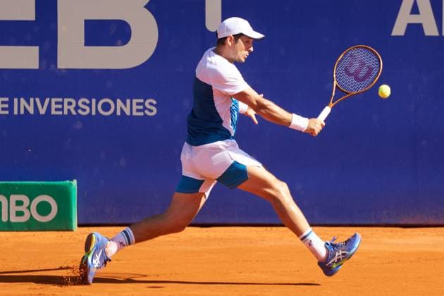 Dusan Lajovic of Serbia returns a backhand to Alejandro Tabilo of Chile during their second round match of the IEB+ Argentina Open 2024 at Buenos Aires Lawn Tennis Club on February 14, 2024 in Buenos Aires, Argentina. (Photo by Camilla Stolen Imago) Buenos Aires Argentina Copyright: xCamillaxStolenx L1710611 1
