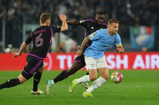 Rome, Italy 14.2.2024: Ciro Immobile of Lazio , Joshua Kimmich of Bayern Munchen in action during the Uefa Champions League 2023-2024, round of 16 football match SS Lazio vs FC Bayern Mucnhen at Olympic Stadium in Rome.  Copyright: xMarcoxIacobucci IPAxSportx xipa-x xx IPA_43441491 IPA_Agency_IPA43441491
