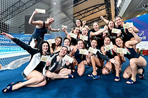 Athletes of team Italy celebrate the Olympic qualification after the Water polo, Wasserball women classification 7th 8th place match between team Canada (white caps) and team Italy (blue caps) of the 21st World Aquatics Championships at the Aspire Dome in Doha (Qatar), February 16, 2024. GiorgioXScala