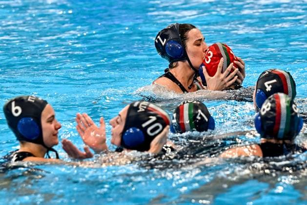 Members of team Italy celebrate the Olympic qualification after the Water polo, Wasserball women classification 7th 8th place match between team Canada (white caps) and team Italy (blue caps) of the 21st World Aquatics Championships at the Aspire Dome in Doha (Qatar), February 16, 2024. GiorgioXScala