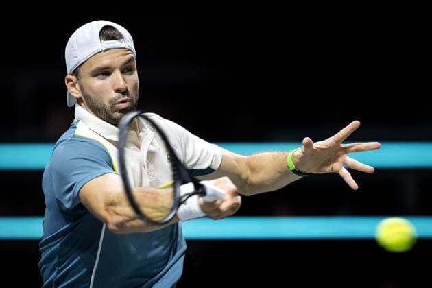 ROTTERDAM - Grigor Dimitrov (BUL) in action against Alexander Shevchenko (KAZ) on the fifth day of the ABN AMRO Open tennis tournament in Ahoy. ANP SANDER KONING ABN AMRO Open 2024 xVIxANPxSportx xxANPxIVx 491249956 originalFilename: 491249956.jpg