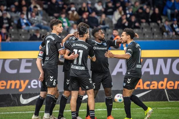 2. Fußball Bundesliga, Hertha BSC vs 1. FC Magdeburg. Berlin, 16.02.2024 Jubel zum 2:2 durch Tobias Müller (1. FC Magdeburg, 21), Mohammed El Hankouri (1. FC Magdeburg, 11) 2. Fußball Bundesliga, Hertha BSC vs 1. FC Magdeburg, Olympiastadion, Berlin, 16.02.2024 DFL REGULATIONS PROHIBIT ANY USE OF PHOTOGRAPHS AS IMAGE SEQUENCES AND OR QUASI-VIDEO.