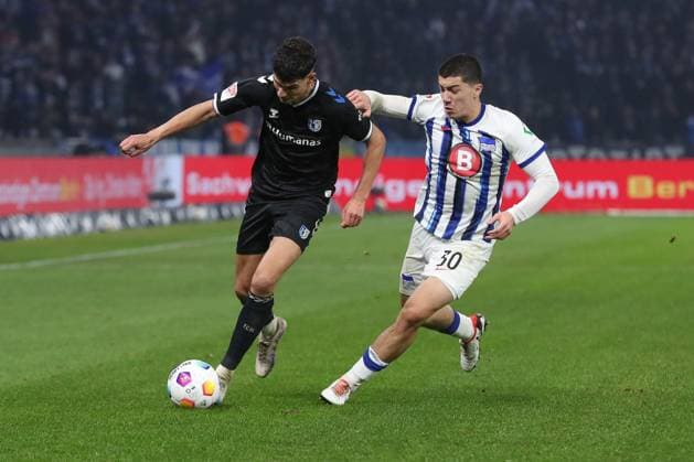 16.02.2024, xtgx, Fussball - 2.Bundesliga, Hertha BSC Berlin - 1.FC Magdeburg emspor, v.l. Daniel Elfadli (Magdeburg, 6), Ibrahim Maza (Hertha, 30) Zweikampf, Duell, Kampf, tackle (DFL DFB REGULATIONS PROHIBIT ANY USE OF PHOTOGRAPHS as IMAGE SEQUENCES and or QUASI-VIDEO) Berlin