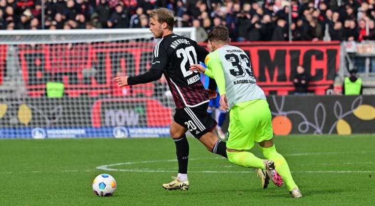 18.02.2024 - Fussball - Saison 2023 2024 - 2. Fussball - Bundesliga - 22. Spieltag: 1. FC Nürnberg FCN ( Club ) - 1. FC Kaiserslautern FCK ( Roten Teufel ) - Sportfoto Zink - xwoxzix - DFL regulations prohibit any use of photographs as image sequences and or quasi-video - only for editorial use - Sebastian Andersson (20, 1. FC Nürnberg FCN ) Jan Elvedi (33, 1. FC Kaiserslautern FCK )