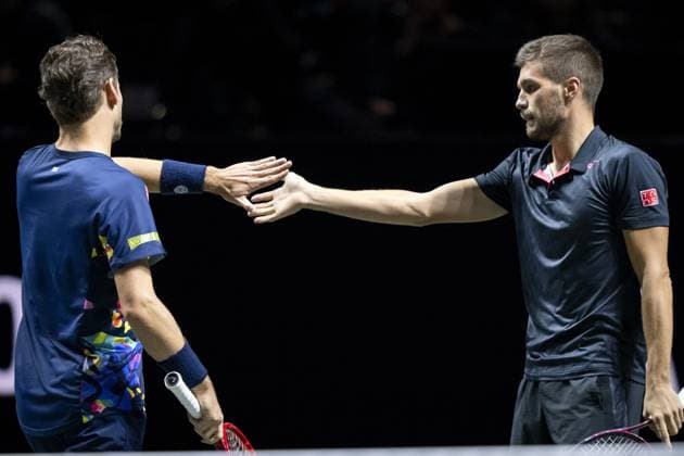 ROTTERDAM - Wesley Koolhof (NED) and Nikola Mektic (CRO) in action against Robin Haase and Botic van de Zandschulp on the last day of the ABN AMRO Open tennis tournament in Ahoy. ANP SANDER KONING ABN AMRO Open 2024 xVIxANPxSportx xxANPxIVx 491424959 originalFilename: 491424959.jpg
