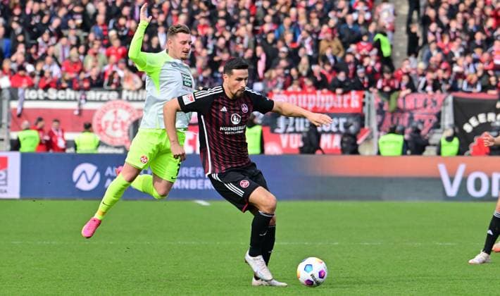 18.02.2024 - Fussball - Saison 2023 2024 - 2. Fussball - Bundesliga - 22. Spieltag: 1. FC Nürnberg FCN ( Club ) - 1. FC Kaiserslautern FCK ( Roten Teufel ) - Sportfoto Zink - xwoxzix - DFL regulations prohibit any use of photographs as image sequences and or quasi-video - only for editorial use - Marlon Ritter (7, 1. FC Kaiserslautern FCK ) Ahmet Gürleyen Guerleyen (3, 1. FC Nürnberg FCN )