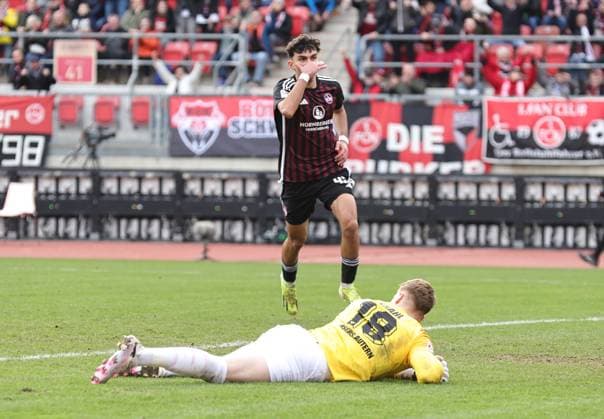 18.02.2024 - Fussball - Saison 2023 2024 - 2. Fussball - Bundesliga - 22. Spieltag: 1. FC Nürnberg FCN ( Club ) - 1. FC Kaiserslautern FCK ( Roten Teufel ) - Sportfoto Zink DaMa - xdaxmax - DFL regulations prohibit any use of photographs as image sequences and or quasi-video - only for editorial use - Jubel Freude Torjubel nach Tor zum 1:1 - Can Yilmaz Uzun (42, 1. FC Nürnberg FCN ) jubelt freut sich - Torschütze: Can Yilmaz Uzun (42, 1. FC Nürnberg FCN )