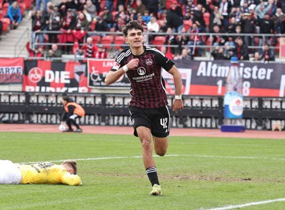 18.02.2024 - Fussball - Saison 2023 2024 - 2. Fussball - Bundesliga - 22. Spieltag: 1. FC Nürnberg FCN ( Club ) - 1. FC Kaiserslautern FCK ( Roten Teufel ) - Sportfoto Zink DaMa - xdaxmax - DFL regulations prohibit any use of photographs as image sequences and or quasi-video - only for editorial use - Jubel Freude Torjubel nach Tor zum 1:1 - Can Yilmaz Uzun (42, 1. FC Nürnberg FCN ) jubelt freut sich - Torschütze: Can Yilmaz Uzun (42, 1. FC Nürnberg FCN )