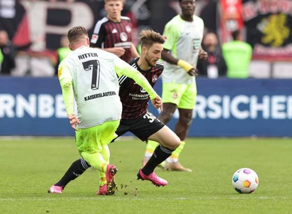 18.02.2024 - Fussball - Saison 2023 2024 - 2. Fussball - Bundesliga - 22. Spieltag: 1. FC Nürnberg FCN ( Club ) - 1. FC Kaiserslautern FCK ( Roten Teufel ) - Sportfoto Zink DaMa - xdaxmax - DFL regulations prohibit any use of photographs as image sequences and or quasi-video - only for editorial use - Marlon Ritter (7, 1. FC Kaiserslautern FCK ) Lukas Schleimer (36, 1. FC Nürnberg FCN )