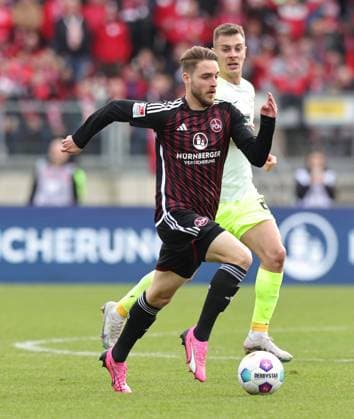 18.02.2024 - Fussball - Saison 2023 2024 - 2. Fussball - Bundesliga - 22. Spieltag: 1. FC Nürnberg FCN ( Club ) - 1. FC Kaiserslautern FCK ( Roten Teufel ) - Sportfoto Zink DaMa - xdaxmax - DFL regulations prohibit any use of photographs as image sequences and or quasi-video - only for editorial use - Lukas Schleimer (36, 1. FC Nürnberg FCN )