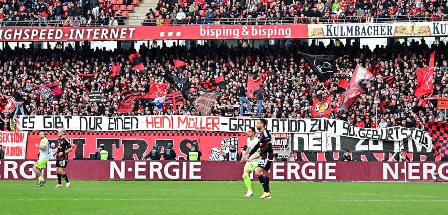 18.02.2024 - Fussball - Saison 2023 2024 - 2. Fussball - Bundesliga - 22. Spieltag: 1. FC Nürnberg FCN ( Club ) - 1. FC Kaiserslautern FCK ( Roten Teufel ) - Sportfoto Zink - xwoxzix - DFL regulations prohibit any use of photographs as image sequences and or quasi-video - only for editorial use - Spruchband Banner Clubfans Fans Fanblock - Geburtstag Heini Müller