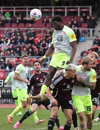 18.02.2024 - Fussball - Saison 2023 2024 - 2. Fussball - Bundesliga - 22. Spieltag: 1. FC Nürnberg FCN ( Club ) - 1. FC Kaiserslautern FCK ( Roten Teufel ) - Sportfoto Zink DaMa - xdaxmax - DFL regulations prohibit any use of photographs as image sequences and or quasi-video - only for editorial use - Ragnar Ache (9, 1. FC Kaiserslautern FCK ) klärt per Kopfball