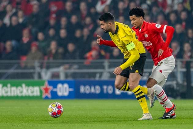 Zweikampf zwischen Emre Can (Borussia Dortmund 09, 23) und Malik Tillman (PSV Eindhoven, 10). Fussball: UEFA Champions League, Saison 2023 2024, Achtelfinale, Runde 1 von 2, PSV Eindhoven - Borussia Dortmund am 20.02.2024 im Phillips-Stadion in Eindhoven. Foto: Kirchner-Media TH Copyright: xKirchner-Media THx