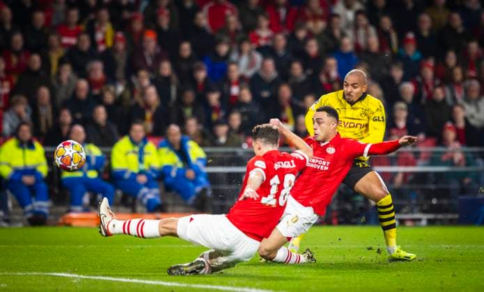 Eindhoven, Netherlands. 20th Feb 2024. Tor zum 0:1 durch Donyell Malen (BVB). Gegen Sergino Dest (Eindhoven) und Olivier Boscagli (Eindhoven) PSV Eindhoven - Borussia Dortmund 20.02.2024