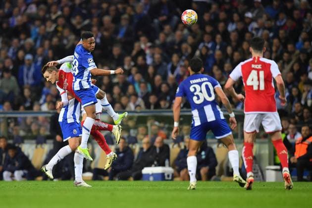 21st February 2024: Dragon Stadium, Porto, Portugal; Champions League football. FC Porto versus Arsenal FC: Marko Grujic of Porto challenges Martin Odegaard of Arsenal  ActionPlus12610899 DanielxCastro