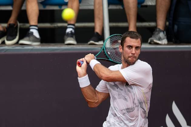 (240223) -- RIO DE JANEIRO, Feb. 23, 2024 -- Laslo Djere of Serbia hits a return during the round 16 match against Dusan Lajovic of Serbia at the 2024 ATP500 Rio Open at Jockey Club Brasileiro in Rio de Janeiro, Brazil, Feb. 22, 2024. ) (SP)BRAZIL-RIO DE JANEIRO-TENNIS-ATP500-RIO OPEN WangxTiancong 