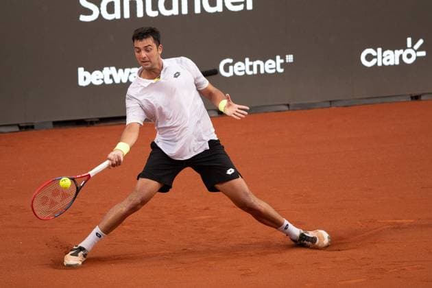 (240223) -- RIO DE JANEIRO, Feb. 23, 2024 -- Marcelo Tomas Barrios Vera of Chile hits a return during the round 16 match against Cameron Norrie of Britain at the 2024 ATP500 Rio Open at Jockey Club Brasileiro in Rio de Janeiro, Brazil, Feb. 22, 2024. ) (SP)BRAZIL-RIO DE JANEIRO-TENNIS-ATP500-RIO OPEN WangxTiancong 