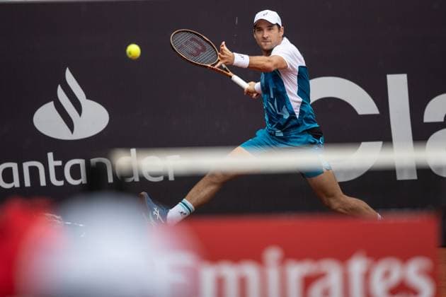 (240223) -- RIO DE JANEIRO, Feb. 23, 2024 -- Dusan Lajovic of Serbia hits a return during the round 16 match against Laslo Djere of Serbia at the 2024 ATP500 Rio Open at Jockey Club Brasileiro in Rio de Janeiro, Brazil, Feb. 22, 2024. ) (SP)BRAZIL-RIO DE JANEIRO-TENNIS-ATP500-RIO OPEN WangxTiancong 