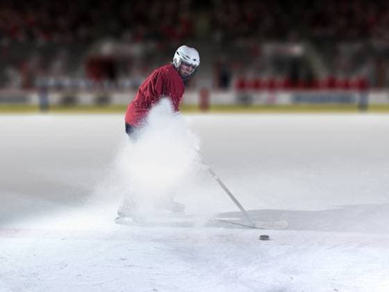 Ice hockey, Eishockey player in action ice hockey player in action kicking with stick (License=RF) 10480855 ,model released, Symbolfoto Copyright: xZoonar.com benisxarapovicx 10480855 ,model released, Symbolfoto ,property released