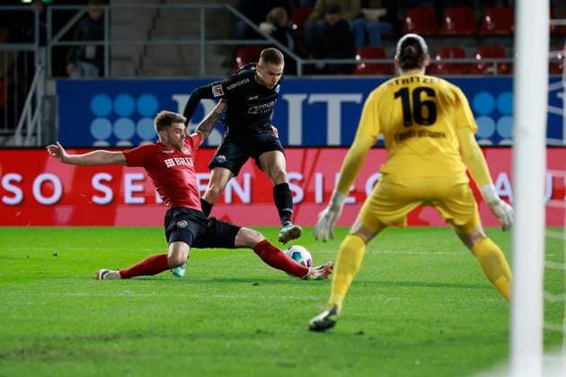 23.02.2024, xavx, Fussball 2.Bundesliga, SV Wehen Wiesbaden - SC Paderborn 07 emspor, v.l. Marcus Mathisen (SV Wehen Wiesbaden), Filip Bilbija (SC Paderborn 07) (DFL DFB REGULATIONS PROHIBIT ANY USE OF PHOTOGRAPHS as IMAGE SEQUENCES and or QUASI-VIDEO) Wiesbaden