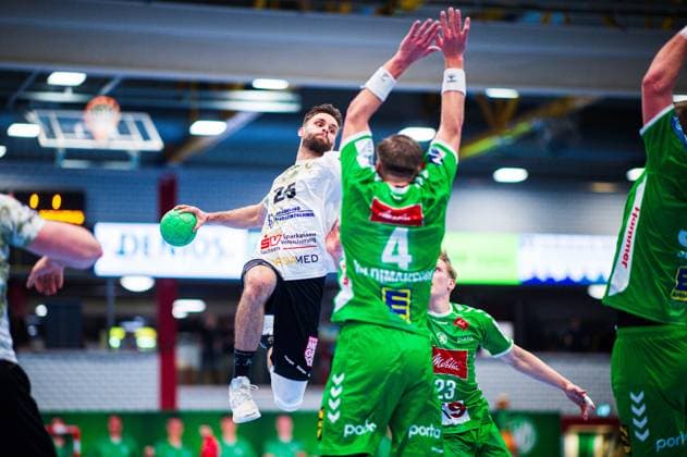 23.02.2024 - Handball, 2023 2024, 2. Bundesliga, 22. Spieltag, GWD Minden - HC Elbflorenz Dresden: (L-R) Sebastian Greß (Elbflorenz), Bjarni Valdimarsson (Minden)