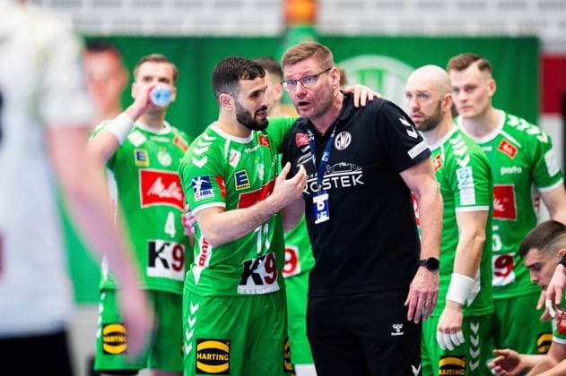 23.02.2024 - Handball, 2023 2024, 2. Bundesliga, 22. Spieltag, GWD Minden - HC Elbflorenz Dresden: (L-R) Mohamed Amine Darmoul (Minden), Aaron Ziercke (Trainer - Minden)