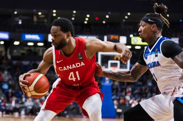 February 23, 2024, St. Catharines, On, Canada: Canada s Lloyd Pandi (41) moves past Jared Ruiz (24) of Nicaragua during first half FIBA AmeriCup qualification play in St. Catharines, Ont., Friday, February 23, 2024. Canada News - February 23, 2024  - ZUMAc35_ 20240223_zaf_c35_151 Copyright: xNickxIwanyshynx