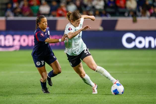 February 23, 2024, Los Angeles, California, USA: Mexico s NICOLETTE HERNoÂNDEZ 2 and Dominican Republic s DAHIEN CABRERA 8 vie for the ball during a 2024 Concacaf Women Gold Cup soccer game in Carson, Calif. on Friday February 23, 2024. Los Angeles USA - ZUMAc68_ 20240223_zaf_c68_020 Copyright: xRingoxChiux