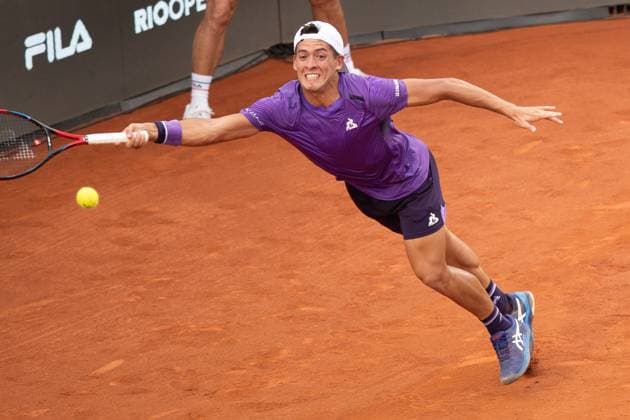 (240224) -- RIO DE JANEIRO, Feb. 24, 2024 -- Sebastian Baez of Argentina hits a return during the quarterfinal against Thiago Monteiro of Brazil at the 2024 ATP500 Rio Open at Jockey Club Brasileiro in Rio de Janeiro, Brazil, Feb. 23, 2024. ) (SP)BRAZIL-RIO DE JANEIRO-TENNIS-ATP500-RIO OPEN-QUARTERFINALS WangxTiancong 