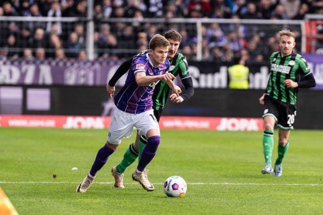 GER, 2. FBL VfL Osnabrück vs Hannover 96 24.02.2024, Bremer Brücke, Osnabrück, GER, 2. FBL VfL Osnabrück vs Hannover 96 Im Bild: Zweikampf zwischen Lukas Kunze (VfL Osnabrück Osnabrueck, 13) und Phil Neumann (Hannover 96, 5)