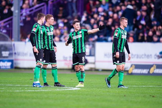 24.02.2024 - Fußball, 2023 2024, 2. Bundesliga, 23. Spieltag, VfL Osnabrück - Hannover 96: (L-R) Fabian Kunze (Hannover), Marcel Halstenberg (Hannover), Enzo Leopold (Hannover), Sebastian Ernst (Hannover) DFL REGULATIONS PROHIBIT ANY USE OF PHOTOGRAPHS AS IMAGE SEQUENCES AND OR QUASI-VIDEO.