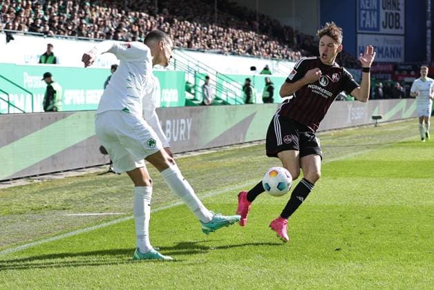 25.02.2024 - Fussball - Saison 2023 2024 - 2. Fussball - Bundesliga - 23. Spieltag: SpVgg Greuther Fürth ( Kleeblatt ) - 1. FC Nürnberg FCN ( Club ) Derby Frankenderby - Sportfoto Zink DaMa - xdaxmax - DFL regulations prohibit any use of photographs as image sequences and or quasi-video - only for editorial use - Maximilian Solomon Dietz (33, SpVgg Greuther Fürth ) Benjamin Goller (14, 1. FC Nürnberg FCN )