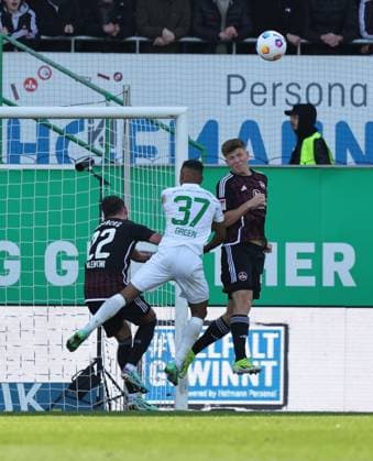 25.02.2024 - Fussball - Saison 2023 2024 - 2. Fussball - Bundesliga - 23. Spieltag: SpVgg Greuther Fürth ( Kleeblatt ) - 1. FC Nürnberg FCN ( Club ) Derby Frankenderby - Sportfoto Zink DaMa - xdaxmax - DFL regulations prohibit any use of photographs as image sequences and or quasi-video - only for editorial use - Enrico Valentini (22, 1. FC Nürnberg FCN ) Julian Green (37, SpVgg Greuther Fürth ) Finn Jeltsch (44, 1. FC Nürnberg FCN )