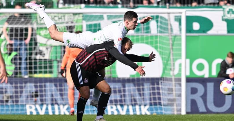 25.02.2024 - Fussball - Saison 2023 2024 - 2. Fussball - Bundesliga - 23. Spieltag: SpVgg Greuther Fürth ( Kleeblatt ) - 1. FC Nürnberg FCN ( Club ) Derby Frankenderby - Sportfoto Zink - xwoxzix - DFL regulations prohibit any use of photographs as image sequences and or quasi-video - only for editorial use - Damian Michalski (4, SpVgg Greuther Fürth ) Sebastian Andersson (20, 1. FC Nürnberg FCN )
