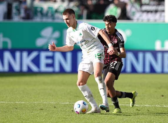 25.02.2024 - Fussball - Saison 2023 2024 - 2. Fussball - Bundesliga - 23. Spieltag: SpVgg Greuther Fürth ( Kleeblatt ) - 1. FC Nürnberg FCN ( Club ) Derby Frankenderby - Sportfoto Zink DaMa - xdaxmax - DFL regulations prohibit any use of photographs as image sequences and or quasi-video - only for editorial use - Tim Lemperle (19, SpVgg Greuther Fürth ) Nathaniel Brown (27, 1. FC Nürnberg FCN )
