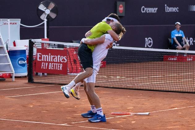 (240226) -- RIO DE JANEIRO, Feb. 26, 2024 -- Nicolas Barrientos (L) of Colombia Rafael Matos of Brazil celebrate victory after the men s doubles final between Lucas Miedler Alexander Erler of Austria and Nicolas Barrientos of Colombia Rafael Matos of Brazil at the 2024 ATP500 Rio Open at Jockey Club Brasileiro in Rio de Janeiro, Brazil, Feb. 25, 2024. ) (SP)BRAZIL-RIO DE JANEIRO-TENNIS-RIO OPEN-MEN S DOUBLES-FINAL WangxTiancong 