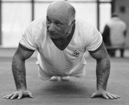 Moscow, USSR. Employee of the State Planning Committee of the Georgian SSR Jumber Lezhava, who set an All-Union record of 4,447 push-ups in an hour, trains in the Dinamo Track and Field Arena. Alexander Yakovlev TASS  18397502
