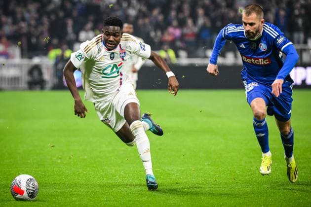 February 27, 2024, Decines-Charpieu, France, France: Ernest NUAMAH of Lyon and Thomas DELAINE of Strasbourg during the French Cup match between Olympique Lyonnais (OL) and Racing Club de Strasbourg at Groupama Stadium on February 27, 2024 in Decines-Charpieu near Lyon, France. Decines-Charpieu France - ZUMAm308 20240227_zsp_m308_001 Copyright: xMatthieuxMirvillex