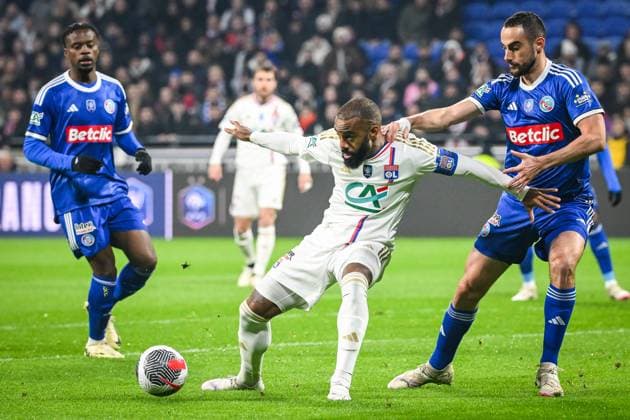 February 27, 2024, Decines-Charpieu, France, France: Alexandre LACAZETTE of Lyon and Lucas PERRIN of Strasbourg during the French Cup match between Olympique Lyonnais (OL) and Racing Club de Strasbourg at Groupama Stadium on February 27, 2024 in Decines-Charpieu near Lyon, France. Decines-Charpieu France - ZUMAm308 20240227_zsp_m308_002 Copyright: xMatthieuxMirvillex