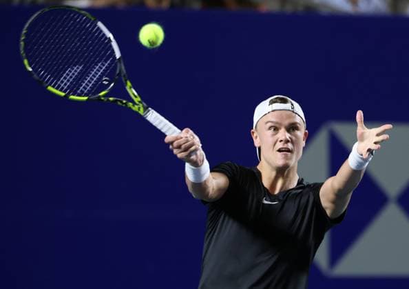 (240228) -- ACAPULCO, Feb. 28, 2024 -- Holger Rune of Denmark hits a return during the men s singles first round match against Michael Mmoh of the United States at the 2024 ATP, Tennis Herren Mexican Open tennis tournament in Acapulco, Mexico, Feb. 27, 2024. ) (SP)MEXICO-ACAPULCO-TENNIS-ATP-MEXICAN OPEN LixMengxin 
