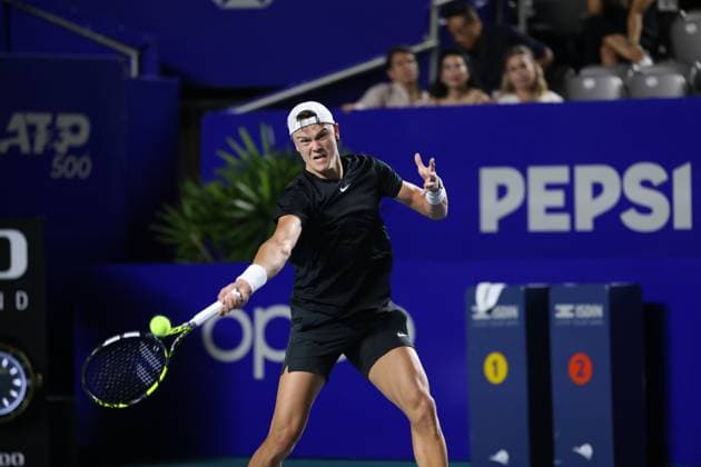 (240228) -- ACAPULCO, Feb. 28, 2024 -- Holger Rune of Denmark hits a return during the men s singles first round match against Michael Mmoh of the United States at the 2024 ATP, Tennis Herren Mexican Open tennis tournament in Acapulco, Mexico, Feb. 27, 2024. ) (SP)MEXICO-ACAPULCO-TENNIS-ATP-MEXICAN OPEN LixMengxin 