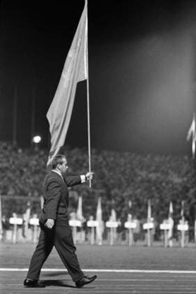 Rome, Italy. Flag bearer of Soviet national team, Nationalteam Olympic champion, world record holder, weightlifter Yuri Vlasov carries a flag of the Soviet Union during the closing ceremony of the 1960 Summer Olympics at the Stadio Olimpico (Olympic Stadium). Viktor Koshevoi TASS  32395077