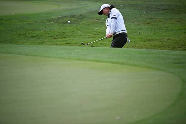 (240301) -- SINGAPORE, March 1, 2024 -- Yin Ruoning of China competes during the second day of the HSBC Women s World Championship, WM, Weltmeisterschaft held in Singapore s Sentosa Golf Club on March 1, 2024. (Photo by Then Chih Wey Xinhua) (SP)SINGAPORE-GOLF-WOMEN S WORLD CHAMPIONSHIP XinxJiapo 