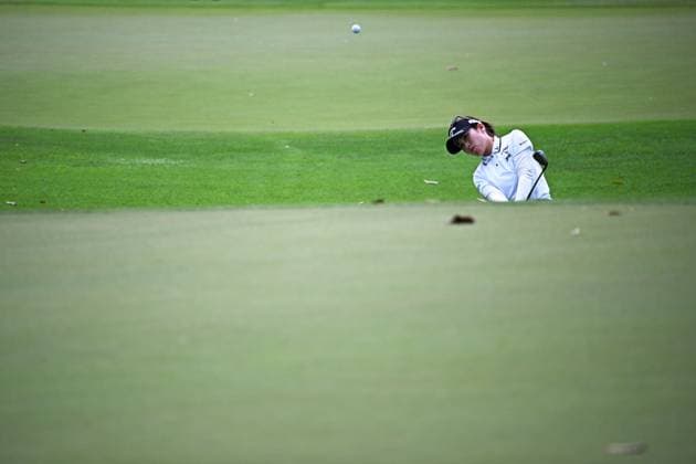 (240301) -- SINGAPORE, March 1, 2024 -- Nishimura Yuna of Japan competes during the second day of the HSBC Women s World Championship, WM, Weltmeisterschaft held in Singapore s Sentosa Golf Club on March 1, 2024. (Photo by Then Chih Wey Xinhua) (SP)SINGAPORE-GOLF-WOMEN S WORLD CHAMPIONSHIP XinxJiapo 