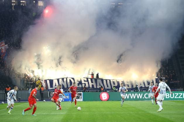 01.03.2024, xtgx, Fussball - 2.Bundesliga, Hertha BSC Berlin - Holstein Kiel emspor, v.l. Symbolfoto, Symbolbild, Fans von Kiel zuenden Pyro, Pyrotechnik, Rauch, Nebel (DFL DFB REGULATIONS PROHIBIT ANY USE OF PHOTOGRAPHS as IMAGE SEQUENCES and or QUASI-VIDEO) Berlin