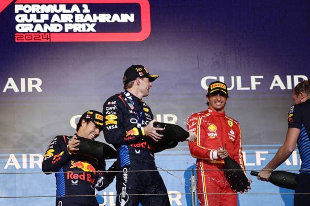 F1 Bahrain Grand Prix 2024 Sergio Perez, Max Verstappen of Red Bull Racing and Carlos Sainz of Ferrari at podium after the Formula 1 Bahrain Grand Prix at Sakhir Circuit in Sakhir, Bahrain on March 2, 2024. Sakhir Bahrain  Copyright: xJakubxPorzyckix originalFilename:porzycki-f1bahrai240302_npRIM.jpg