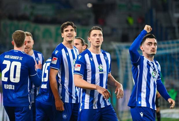 Germany, Karlsruhe, 02.03.2024, BBBank Wildpark, Karlsruher SC vs SpVgg Greuther Fuerth - 2. Bundesliga, Igor Matanovic (Karlsruher SC), Nicolai Rapp (Karlsruher SC) und Paul Nebel (Karlsruher SC) celebrate the first goal of their team Karlsruhe BBBank Wildpark Baden-Wuerttemberg Germany