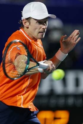 (240303) -- ACAPULCO, March 3, 2024 -- Australia s Alex De Minaur hits a return during the men s singles final against Norway s Casper Ruud at the 2024 ATP, Tennis Herren Mexican Open tennis tournament in Acapulco, Mexico, March 2, 2024. (Photo by Xinhua) (SP)MEXICO-ACAPULCO-TENNIS-ATP-MEXICAN OPEN-FINAL FranciscoxCanedo 