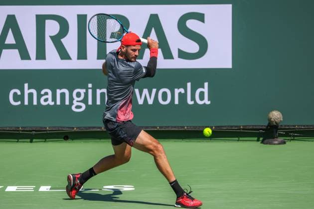 INDIAN WELLS, CA - MARCH 05: Andrea Vavassori (ITA) hits a backhand during the qualifying round for the BNP Paribas Open on March 5, 2024 at Indian Wells Tennis Garden in Indian Wells. CA. (Photo by George Walker Icon Sportswire) TENNIS: MAR 05 BNP Paribas Open EDITORIAL USE ONLY Icon240305026