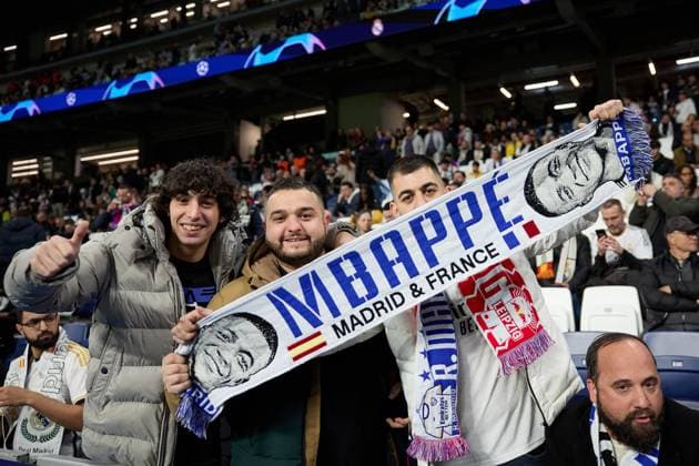 Supporters of Real Madrid with Mbape scarf during the UEFA Champions League match between Real Madrid v RB Leipzig at Santiago Bernabeu on March 6, 2024 in Madrid (Photo by: LGM) FOOTBALL : Real Madrid vs RB Leipzig - UEFA Ligue des Champions - 06 03 2024 LGM Panoramic 